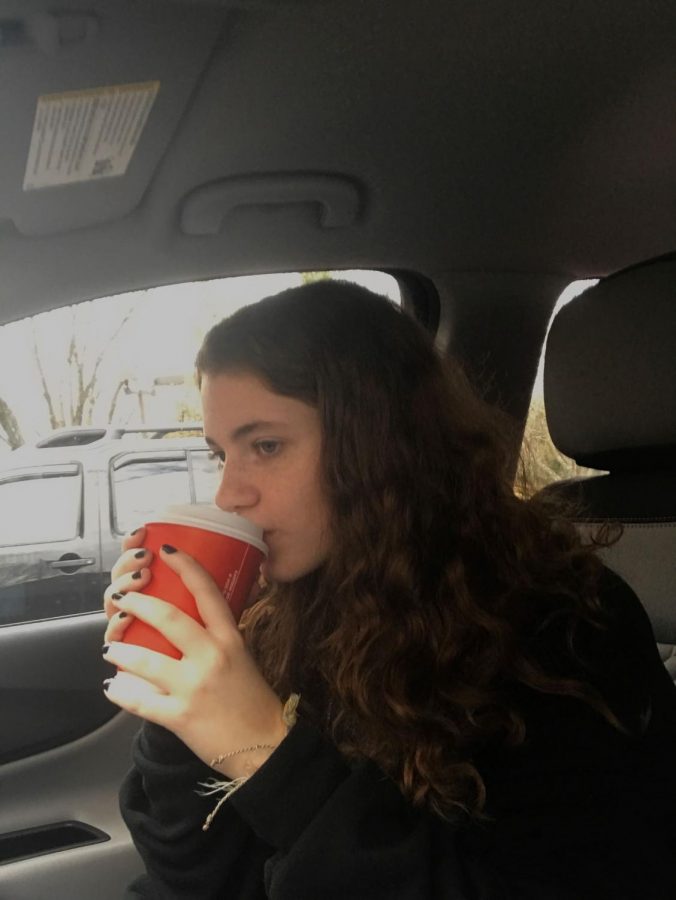 ‘A latte’ to think about...Reviewing coffee from various fast food restaurants, coffee consumer Madison Stine endures the first sip of a Wendy’s hot coffee. Along with Wendy’s, Stine reviewed McDonalds, Chick-fil-a, Burger King and home-brewed coffee.
