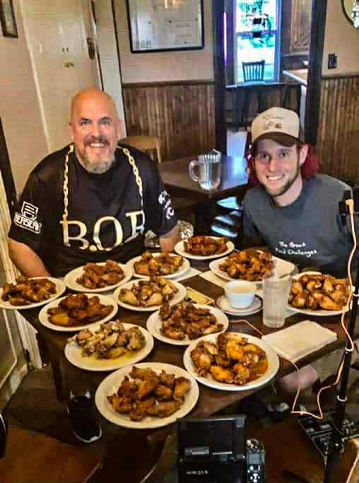 Winner winner chicken dinner...Preparing to devour the massive portion of wings are competitive eaters Bob Shoudt (left) and Joshua Krady. The two competitive eaters devoured the wings together. Photo by Joshua Krady
