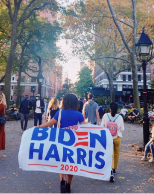 Celebrating victory...Walking through Washington Square Park in New York on November 7, Manhattan College senior Nina Nuñez partakes in a pro-Biden celebratory march. On this day, Biden surpassed 270 electoral votes and was announced to be the 46th president of the U.S.