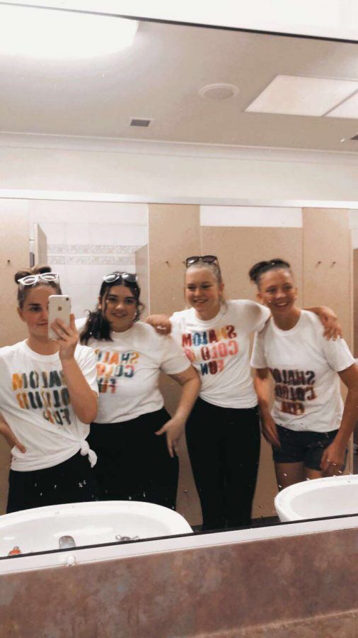Snapping away down under...Year 11 student, Bailey Ward (left) and her friends (left to right) Claire Fava, Frances Corpe, and Jayne Wake, take mirror pictures while they participate in a color run to raise charity. Right now, students in Australia just ended their 12 week holiday vacation and went back on Thursday, January 28.