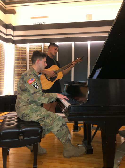 Enjoying with the music.... Escaping stress of school and society, pianist Anthony Capatta plays piano. He is joined by his close friend Aaron Lee.               Photo by Anthony Capatta
