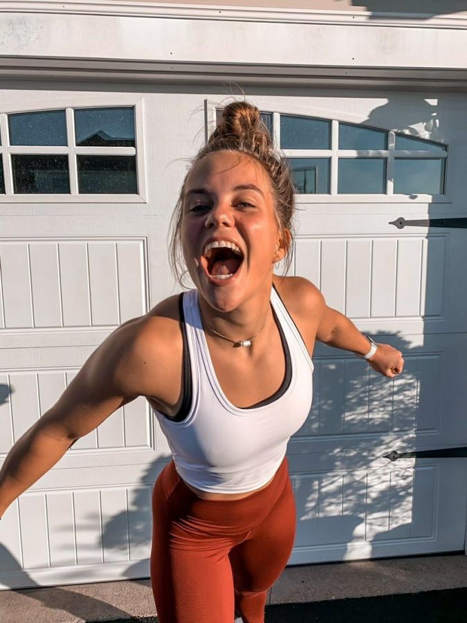 Warmed up and ready to go… after launching her account in October of 2020, Abby Tuttle posts an energetic picture as an introduction to her followers. The account, @abbytuttle_fit, hosts Tuttle’s workouts and fitness endeavors. Photo courtesy of Emily Tuttle. 
