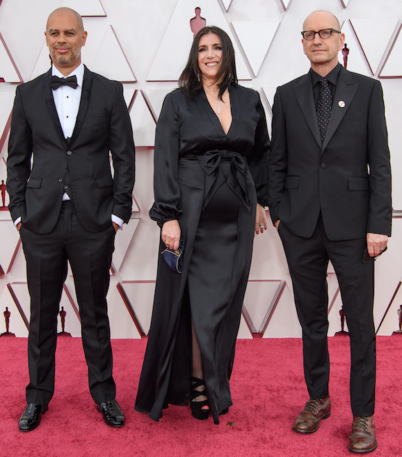 ***Producing memories…**Enjoying a moment on the red carpet at Union Station, (from left) 2021 Oscars producers Jesse Collins, Stacey Sher and Steven Soderbergh gather prior to the show. “On The Red Carpet at the Oscars” was broadcasted at 6:30 p.m on ABC. Photo Courtesy of The Academy of Motion Pictures Arts & Sciences (AMPAS)*

