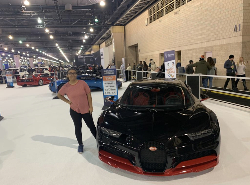 **Driving in Philadelphia visitors…***While visiting the Philadelphia Auto Show, Freshman Kelsea Clarke was able to take pictures with and go inside cars like a Bugatti. The Philadelphia Auto show, held at the convention center each year, was postponed due to COVID-19.*
