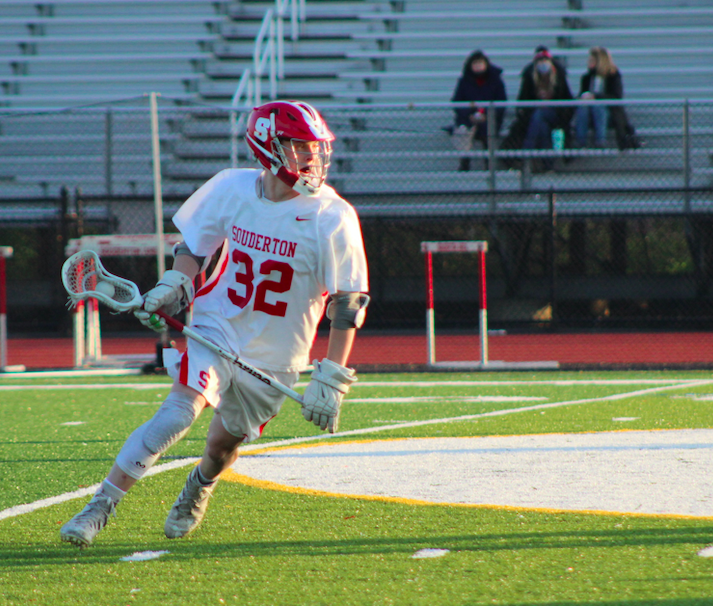 ***Rough start...**As the game reaches its halfway mark, Souderton player Luke Warwzynek gets the ball and hopes to score one last time before the half.  On April 23 Souderton played at home against Council Rock South and the team worked together and came out on top.*
*Photo by Arrowhead Staff Writer Jessica Ace*