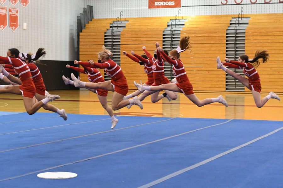 ***Gooo Indians...**At their first suburban one district competition since COVID-19 the Souderton girls varsity cheer team runs through their floor routine.  The competition took place on March 6 and this year it was held at Souderton Area High School.*  
*Reprinted with permission of LifeTouch Photo Company*
