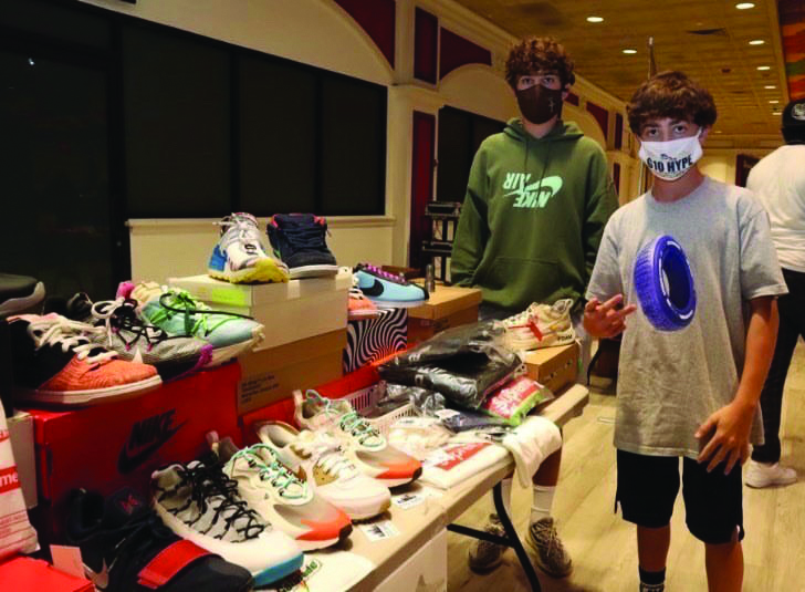 New kicks...Displaying their collection, Brody Huss (left) and Clayton Ruff show off shoes at a sneaker convention. The convention took place in September 2020 and consisted of several sneaker resellers who displayed, exchanged and bought shoes.