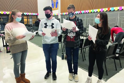 Falalalala...Preparing for the upcoming PMEA choral festival in February, (from left) choral students Kacie Watkins, Mason Miller, Jackson Rohrbaugh, and Anna Roman practice. 