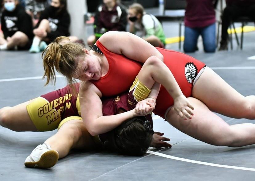 Moments from victory…Going for the win, senior Trinity Monaghan successfully pins down Governor Mifflin High School senior Liliana Campitelli during the 2021 State Final. This victory landed Monaghan in first place in the 222 pounds weight class.
