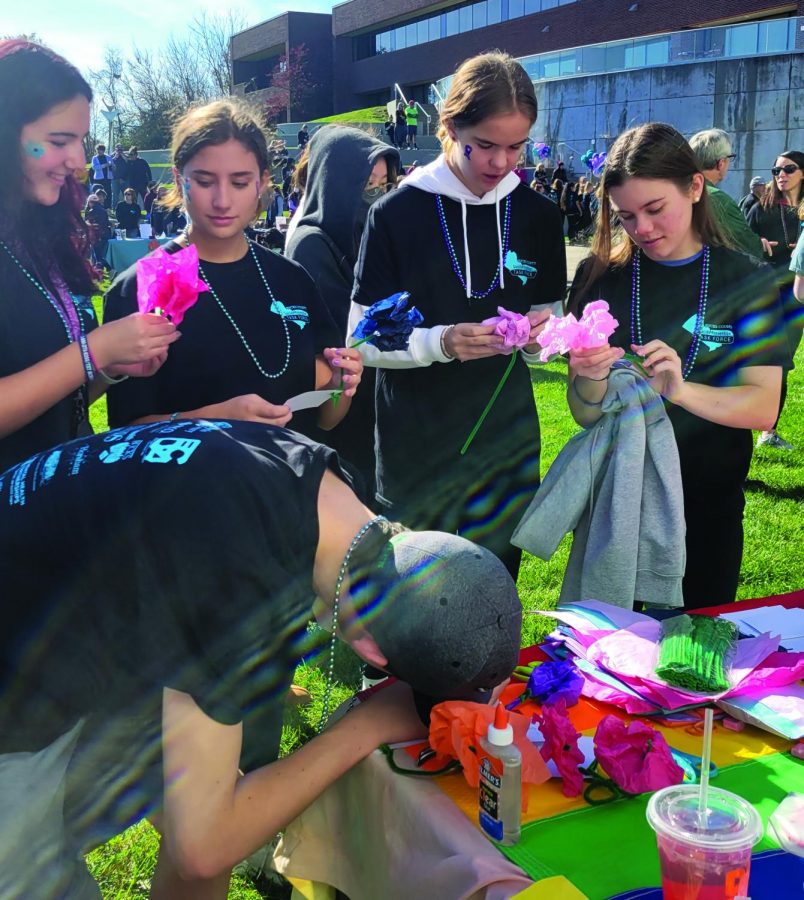 Growing positive…At the Hold on You Matter Walk on November 6, members of the Peyton Heart Project Club create flowers and write positive messages to themselves or others. The Hold on You Matter Walk took place on the Bucks County Community College campus.