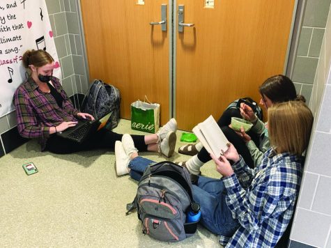 Kick back...Using their Lunch and Learn time productively, (from left) seniors Kate Taipale, Caitlin Renner and Carolyn Mowery study and eat lunch together. The girls enjoyed some “relaxation time.”