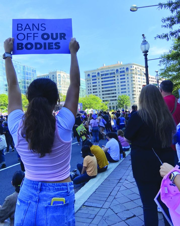 Standing for a cause...Raising her sign to spread a message, 2020 Souderton alumna Cassie Rodrique takes in the “Bans Off Our Bodies” protest in Washington D.C. The event took place on October 2.