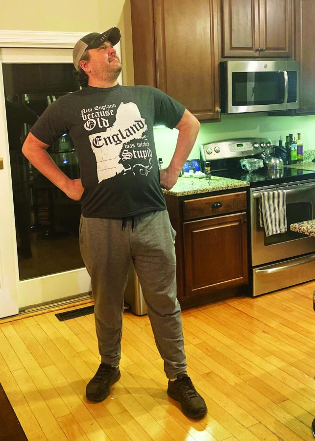 Striking a pose…Wearing a dad joke t-shirt, dad Andy Hassett proclaims,“New England because Old England was wicked stupid.”