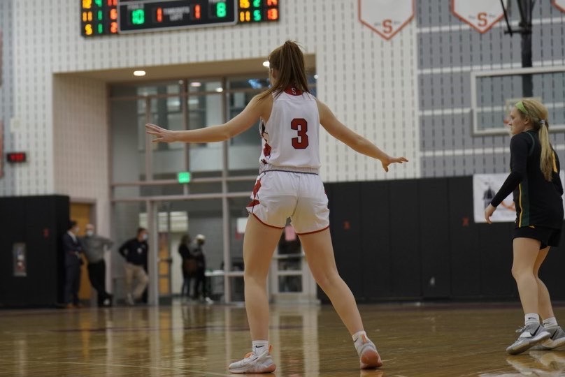 Posted+up%E2%80%A6Widening+her+stance%2C+sophomore+Brooke+Fenchel+%28left%29+plays+defense+against+the+opposing+team.+Fenchel+is+currently+a+varsity+starter+for+Souderton.