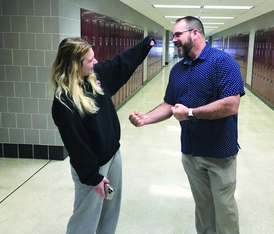 Chatting between classes…During the school day, senior Izzy Feliciani meets with her dad, business teacher Mike Feliciani, to joke around and catch up. Izzy appreciates having a parent to talk to and ask for snacks in the hallway.