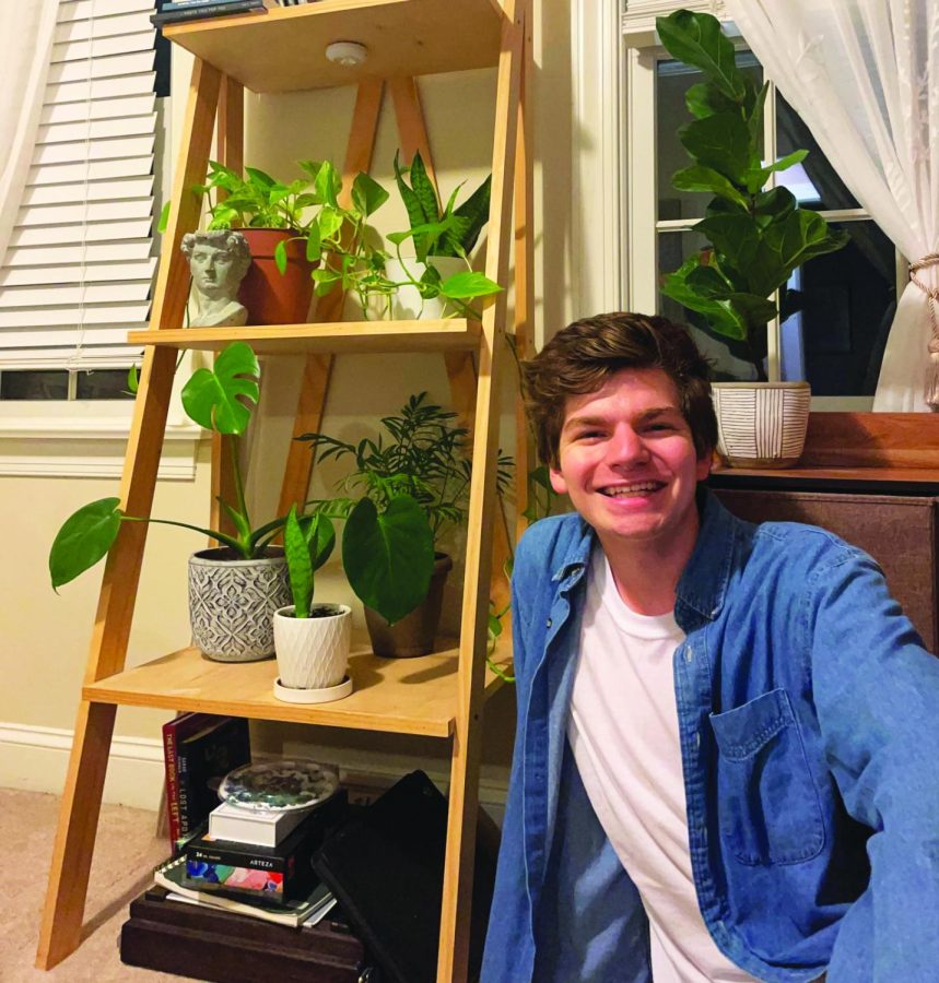 Posed and potted...Spending some quality time with his floral friends, senior Jason Edwards shows off his collection of houseplants. Edwards purchases most of his plants from Ott’s Exotic Plants in Schwenksville.
