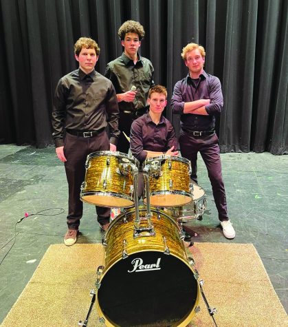Local celebrities...At the end of the jazz band’s home show, members of The Wayside (from left) Nick Mancini, Andrew Brown, Ethan Frattarelli and Preston Ziegenfuss pose for their official band photo. Other official band content can be found on their Instagram account, @TheWaysideOfficial.