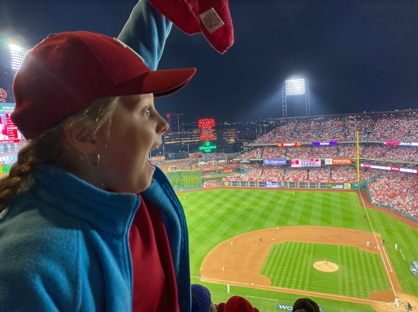 Fightin Phils…Cheering on her favorite team,  fifth grader Charlotte Vincent rallies with the crowd during game four of the 2022 World Series at Citizens Bank Park. The Philadelphia Phillies went on to lose the November 2 game against the Houston Astros 5-0.
