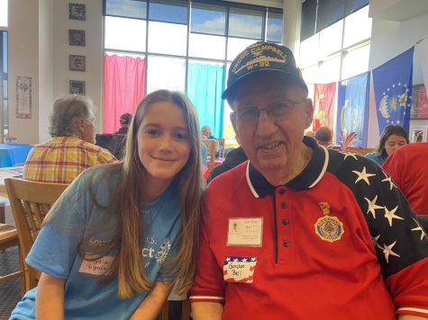 Honoring the troops…Sharing war stories, veteran Gordon Bell connects with freshman Jackie Lee. The Veterans Brunch, which was held November 12, allowed students to acknowledge the sacrifices veterans have made. 
