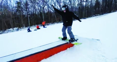 Shredding fresh powder…Snowboarding down the mountain, Spring Mountain employee Jake Oskowitz hits the rail. With fresh snow and friends, it can make for a fun memory.
