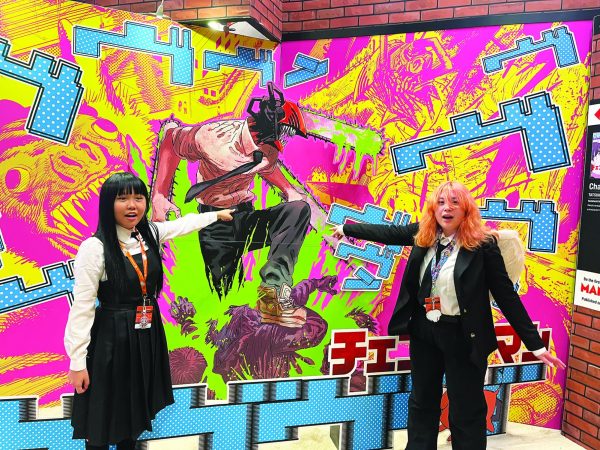 Entranced by anime…Cosplaying as Yoru and Angel Devil from the anime “Chainsaw Man,” senior Serena Bui (left) and junior Alison Eng attend the 2023 New York Comic Con. 