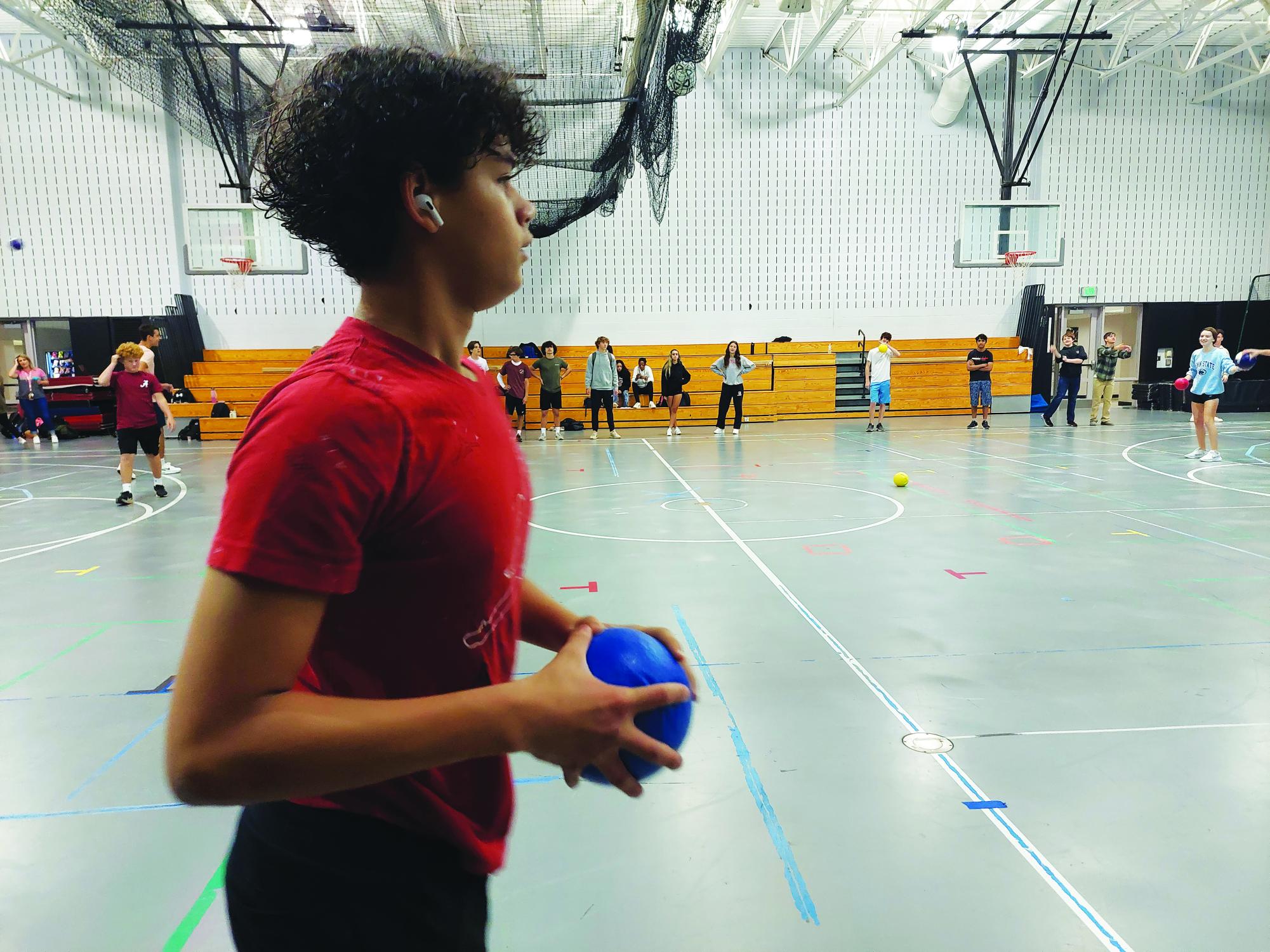 Dodging loneliness…Playing the game, freshman Yariel Rodriguez participates in a Red Zone game of dodgeball hosted by Link Crew on October 6. Link Crew hosted several Red Zone events to help the freshman accumulate to the high school. 