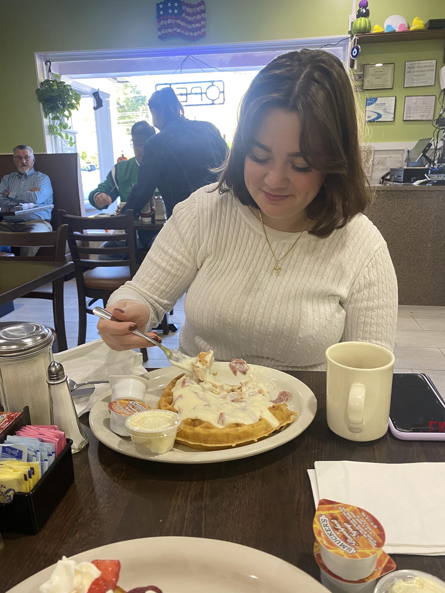 Whats up Peeps...Enjoying a waffle, junior Abby Nyce eats breakfast at Peeps Diner in Harleysville, Pa. The diner is open everyday from 6:00 a.m. to 3:00 p.m. 