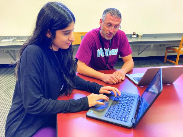 Common college problems…Guiding senior Khushi Thaker through the Common App process, college counselor Tom Overberger’s new role gives students a person to go to with questions and concerns about post-secondary education.