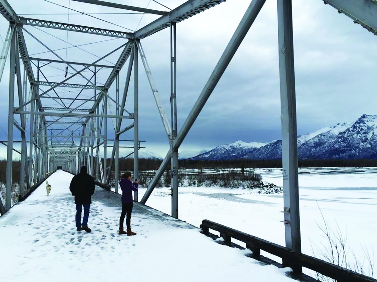 Chilling views… Exploring together, Souderton alumna Kate McQuade admires Knik River in Palmer, Alaska alongside her grandfather, Merrill Gehman, in 2015. 