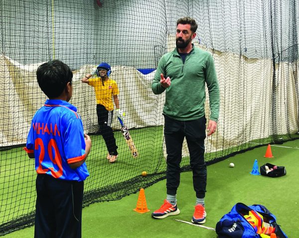 On a sticky wicket…Explaining proper bowling technique, ex-English cricketer Liam Plunkett (right) leads a one-on-one session with Under-11 Philly Knights Vice Captain Vihaan Puppala weeks before an Under-12 MLC Jr tournament in Tampa Bay, Florida. 
