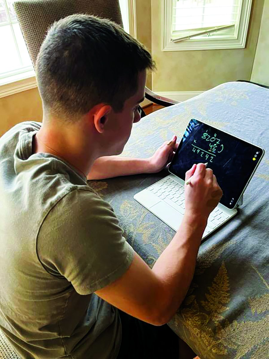 Lending a helping hand…drawing out an equation, Sharing Minds co-founder Ariel Levin walks a student through their work for the day. Levin utilizes technology to virtually tutor a student, which is a common practice amongst Sharing Minds’ tutors.