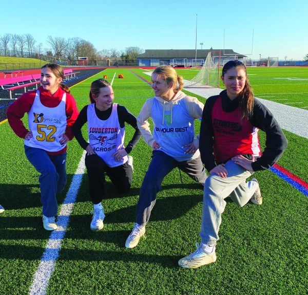 Stretching it out…Preparing for an off-season lacrosse practice, (from left) freshmen Callie Gehman, Cammy Moyer, Allie Haubenstein and Olivia Constanzer stretch by doing lunges.
