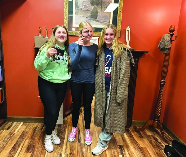 Cracking the case…Escaping the Baker Street Mystery escape room, sophomores Kendall Moyer (left), Kami Ziegler (middle) and Charlotte McNeill leave Expedition Escape successfully. Expedition Escape will begin planning two new escape rooms at their King of Prussia location as of March 28.