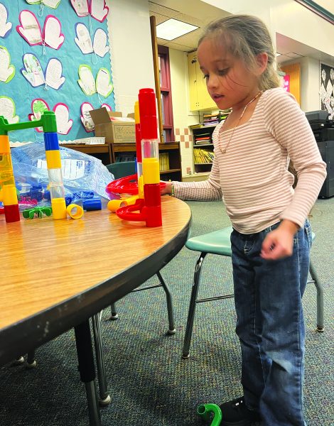 Growing with STEM…Building a marble run, Oak Ridge Elementary first grader Alivia Boadnaraine participates in one of the after school programs. 