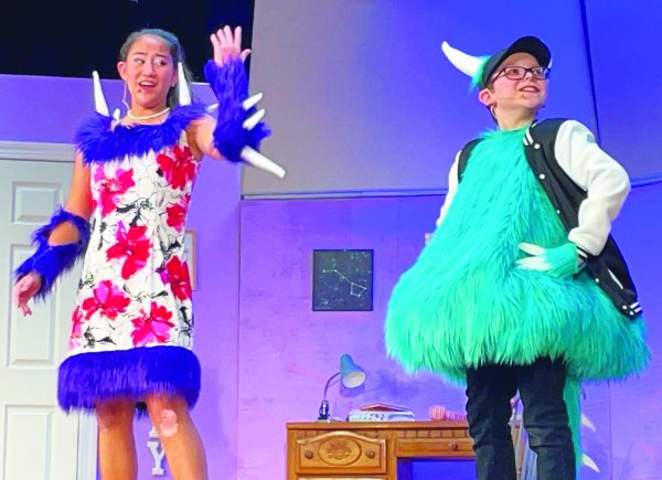 A monster success…Getting their “groove on,” eighth grader Leilani Souder (left) and sixth grader Finn Shelley perform a duet in “There’s a Monster in my Closet.” The three shows took place at Indian Valley Middle School on March 7-9.