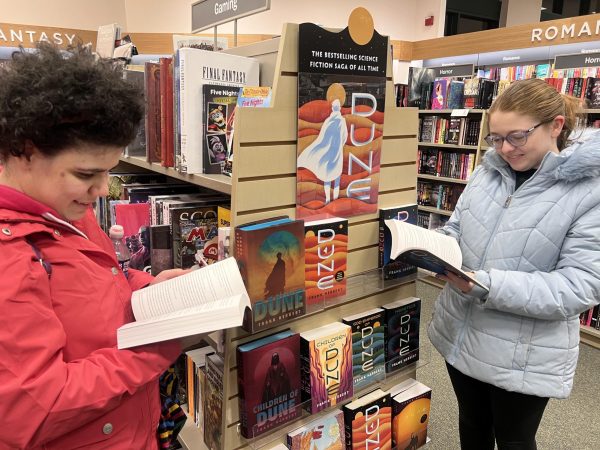 Paging through “Dune”…Exploring the science fiction shelves, Montgomery County Community College student Alexis Kandy and Gwynedd Mercy University student Emily Schwenk discover the books in the “Dune” section at Barnes & Noble. “Dune: Part Two” was based on the first book in the “Dune” series written in 1965 by Frank Herbert. 