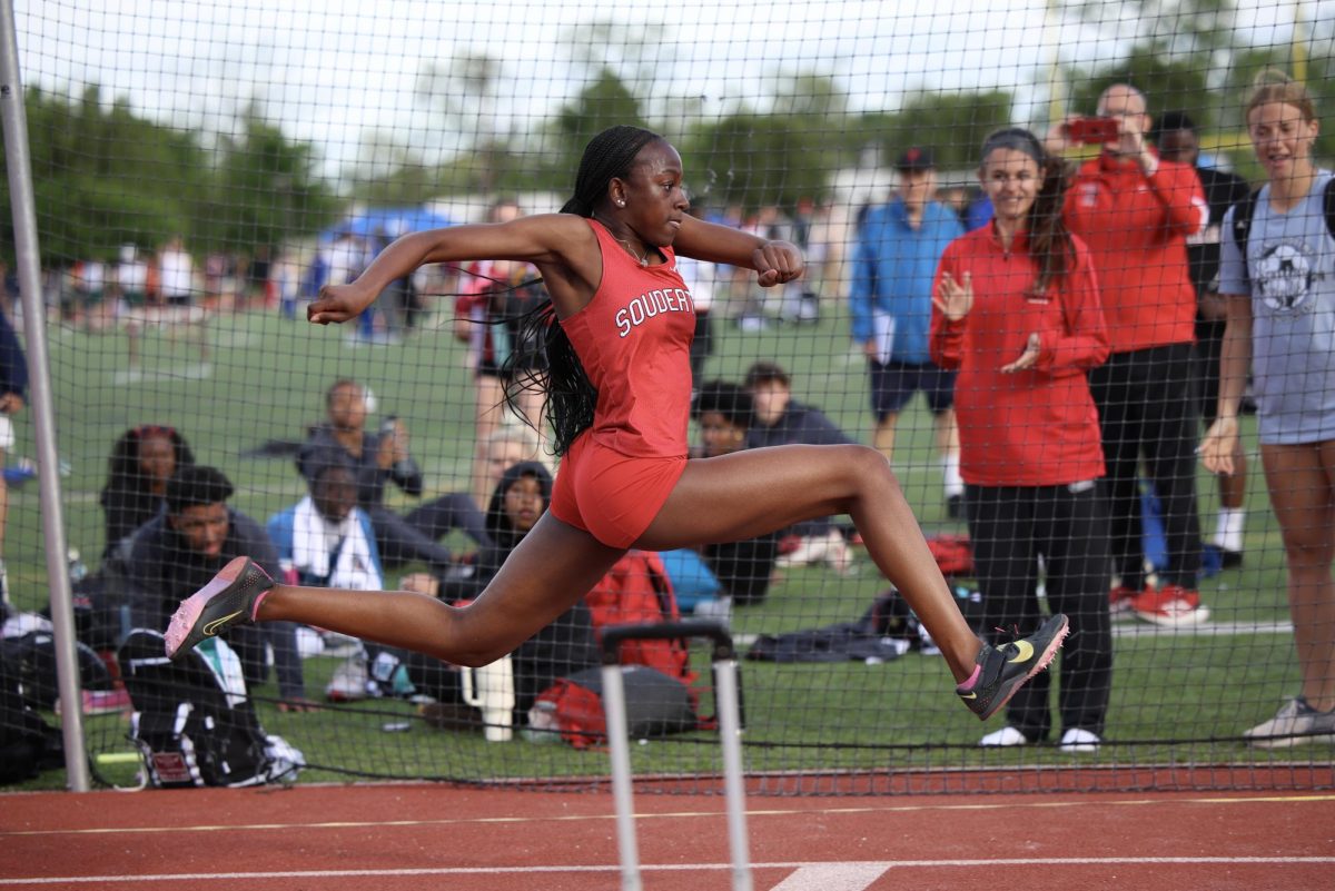 Go+ahead+and+jump...Breaking+records+for+the+triple+jump%2C+junior+Destini+Smith+placed+first+at+the+Henderson+High+School+track+invite+on+May+3.