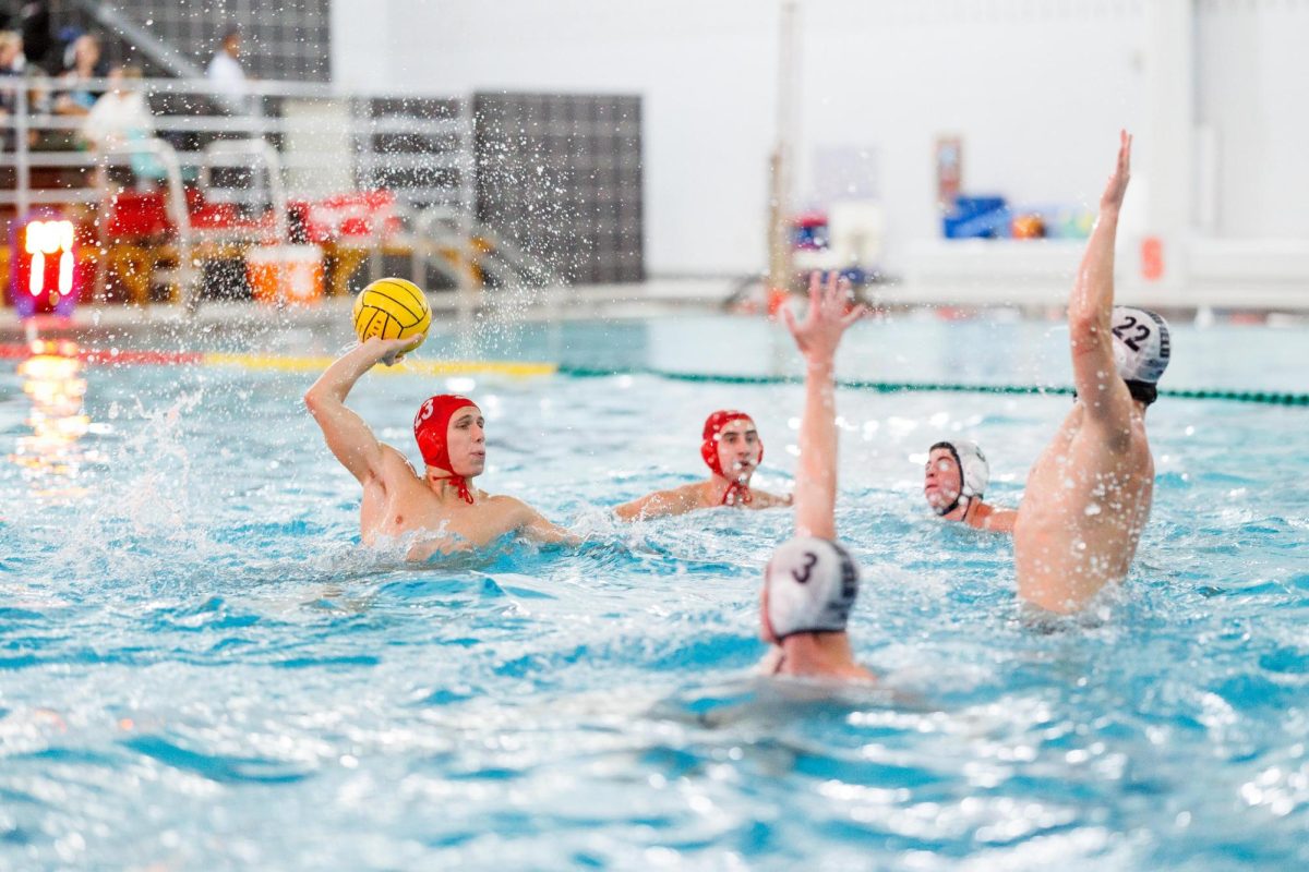 Splashing around...Competing against Springfield, junior Eli Bleazard holds possession for Souderton, alongside teammate Ryan Gilbert. 