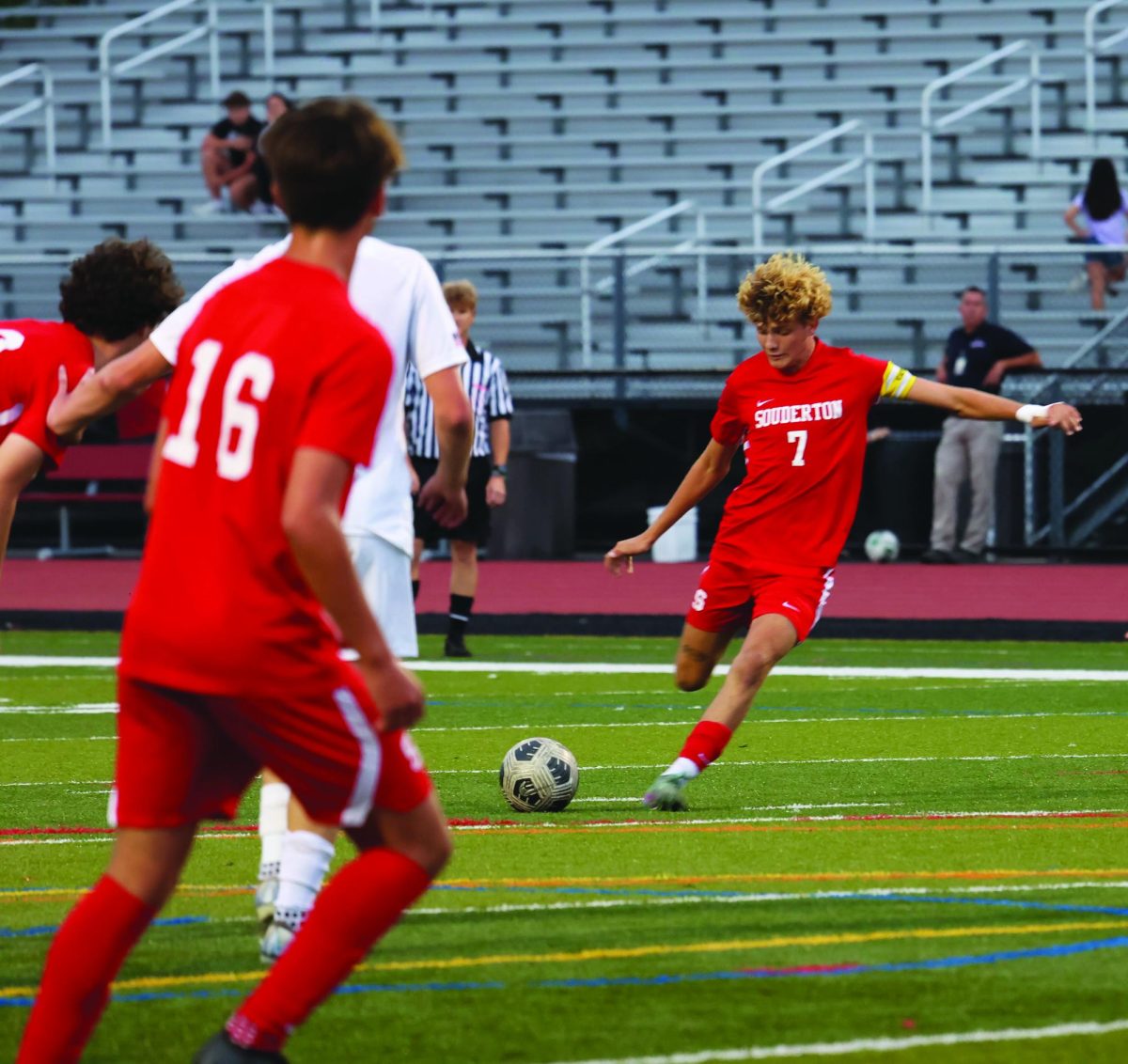 Chasing victory…Hoping to make a successful pass to his teammate, striker Tannor Wiszneski (right) aims the ball towards striker AJ Pisoni during a game against Central Bucks South High School on September 17.