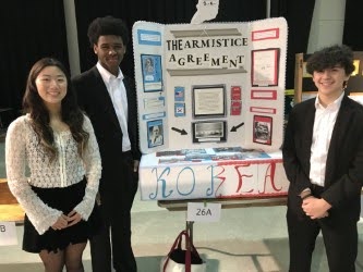 Presenting projects…During last March’s National History Day, then eighth graders Arianna Im, (left) William Osei, and Alex Colien share their work with attendees. National History Day is held at Indian Valley Middle School.