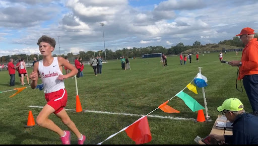 Boys cross country defends their league champs title