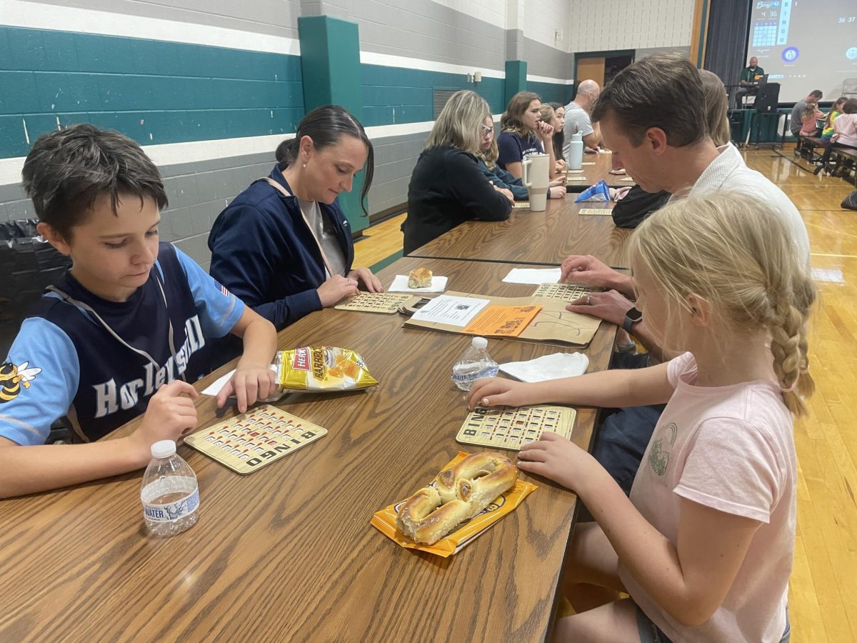 Bonding…To spend quality time together and win prizes, the Smith family enjoys Oak Ridge Elementary School’s annual bingo night. The event took place on November 1 in the Oak Ridge Elementary gymnasium.
