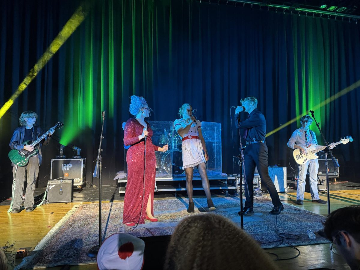 Rocking and rolling…During the rock band’s most recent performance (from left) members Skylar Bass, Shannon Stover, Cole Hamilton, Charlie Whiteman and Timmy Stopyra play for the crowd. The concert was held on October 30, and was part of a fundraiser for the class.