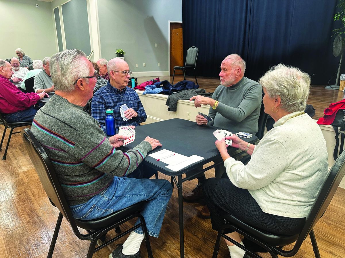 Playing their cards right…  Enjoying their afternoon at Generations of Indian Valley (Generations), senior citizens (from right) Shirley Elnitski, John Bergen, Paul Glass and Douglas  Armkassia are playing the card game pinnacle. Generations allows for a space for people to connect and spend time together.