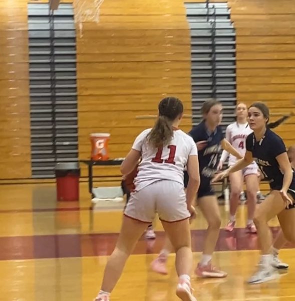 Shooting for success… Taking her shot, junior Mia Morgan prepares to make a basket in the game against Council Rock South. The game took place on January 10 in Souderton’s gym.