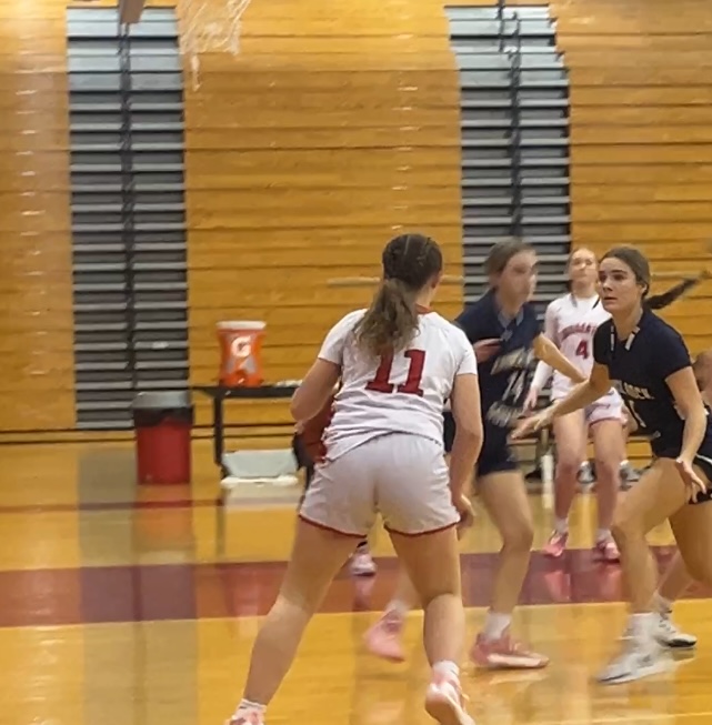 Shooting for success… Taking her shot, junior Mia Morgan prepares to make a basket in the game against Council Rock South. The game took place on January 10 in Souderton’s gym.