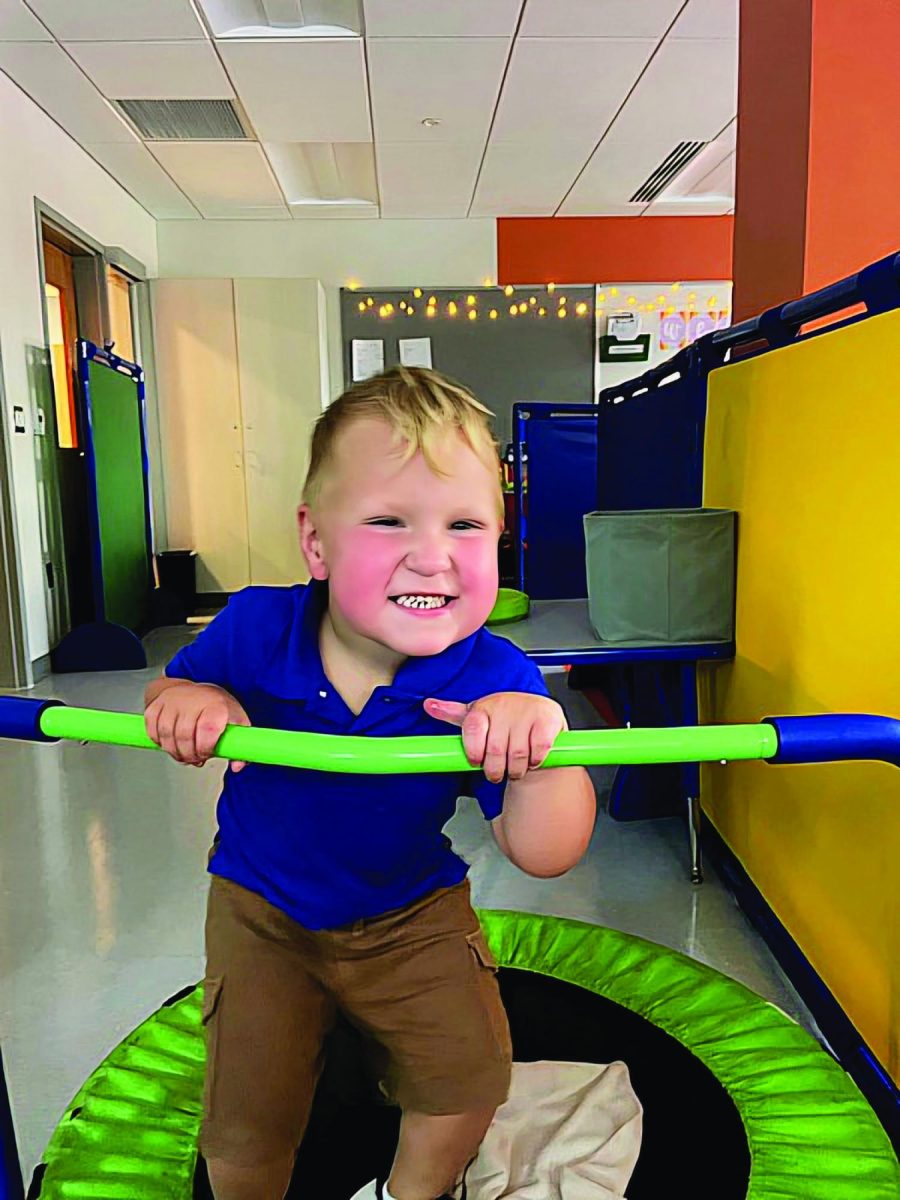 Embracing neurodiversity...Taking a stim break, 4-year-old Logan Welsh enjoys time in his preschool classroom at the MCIU Discovery Center in Lansdale, Pa. 