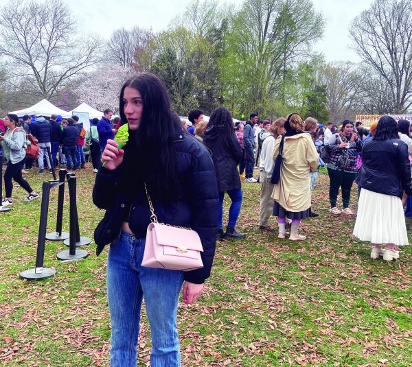 Testing…Expanding her cultural palette, senior Kaylee Broyles enjoys authentic matcha soft serve ice cream from Matcha Cafe Maiko, a vendor at the festival. 