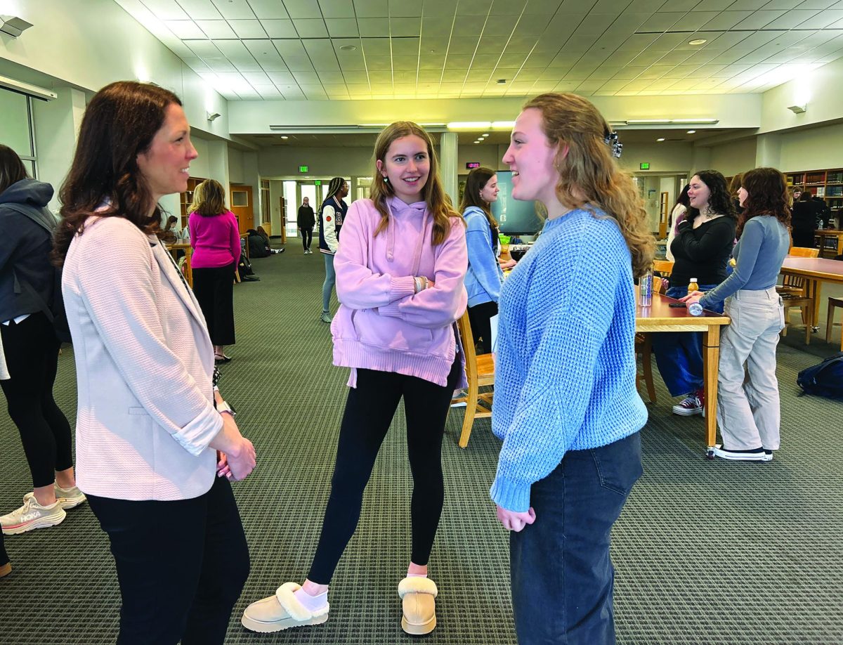 Celebrating sisterhood…Following up with Lutron Electronics Company Vice President Laura Gabriel (left), sophomores Brooke Fowler (center) and Sara Geschwindt have a conversation with Gabriel. The Young Women Rising Symposium took place on April 2.