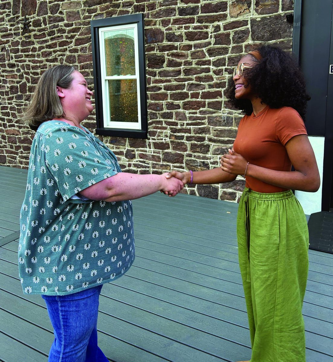  Just the beginning…Shaking hands goodbye, Souderton Connects Manager Jessica Cimini and sophomore Condoleezza Oyesola leave their first meeting for the 3rd Friday mentorships. 